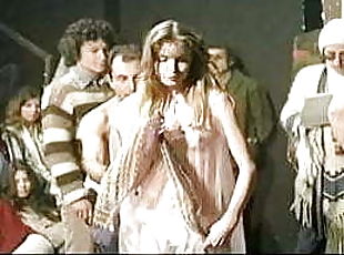 S. Buchanan in see thru outfit with white satin panty 1977 