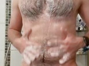 Cute handsome bi-sexual guy jerking off in a shower and playing with ass