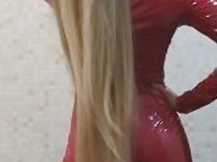 Horny long blond hair teen girl dressed in latex for striptease