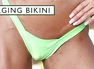FBB big clit bulges out of tiny bikini