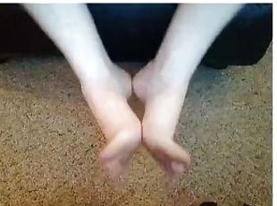 Becky doing a foot strip tease