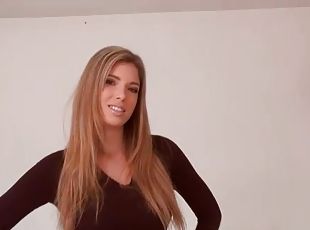 Curvy girl in jeans and tight top chats to camera