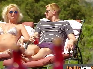 Swingers open up their legs and pants to welcome this amateur couple with hopes of a new lifestyle