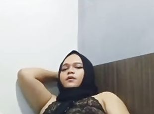 Crossdresser in lingerie rubbing his cock