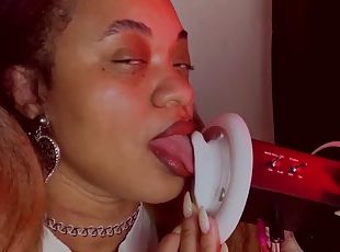 Ebony chick with sexy lips licks ears