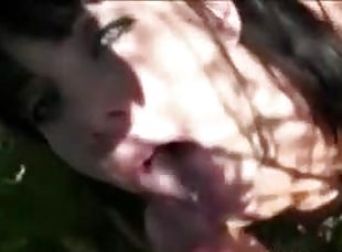 Cumshot in her mouth outdoors