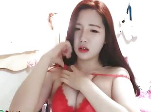 Asian cute camgirl shows her big tits