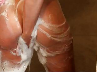 Solo milf with booty to die for soaping up herself in the shower
