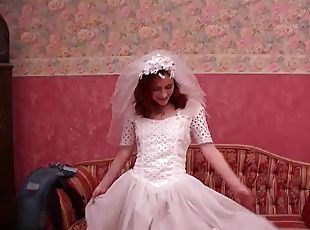 Redhead bride being taken