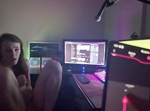 Gamer girl plays Overwatch while boyfriend uses her vibrator.