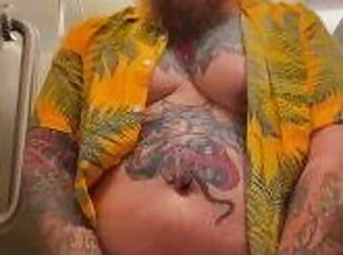 Bearded Tattooed Daddy jerks off in public restroom