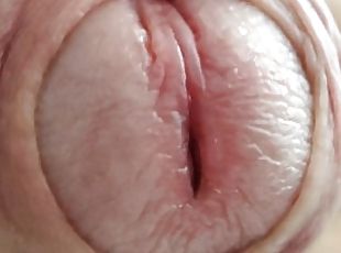 Gentle stroking of uncut cock (close up)