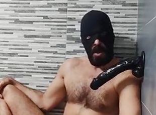 Masked daddy moans and sucks dildo