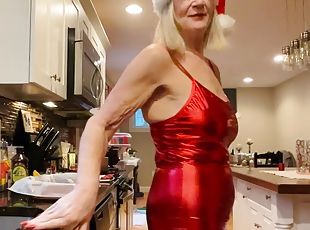 Danielle Dubonnet 65 year old MILF cooks in tight red dress and heels