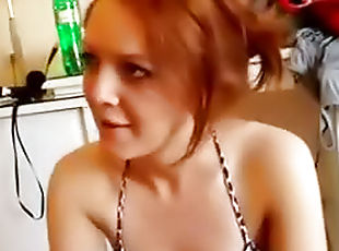 Redhead on her knees worships dick