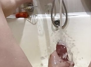 Masturbating with tap water in the bathroom in slow motion 4K