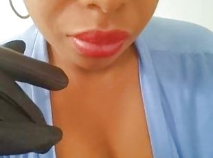 Ebony girl in biker gloves sucks a dildo passionately for you