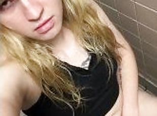 Slim blonde tgirl shows herself in public bathroom