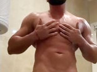 Muscular guy jerks off in the shower and cums all over the camera